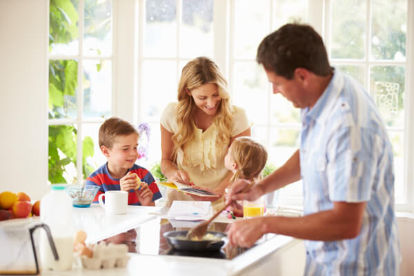 family in the kitchen cooking having fun